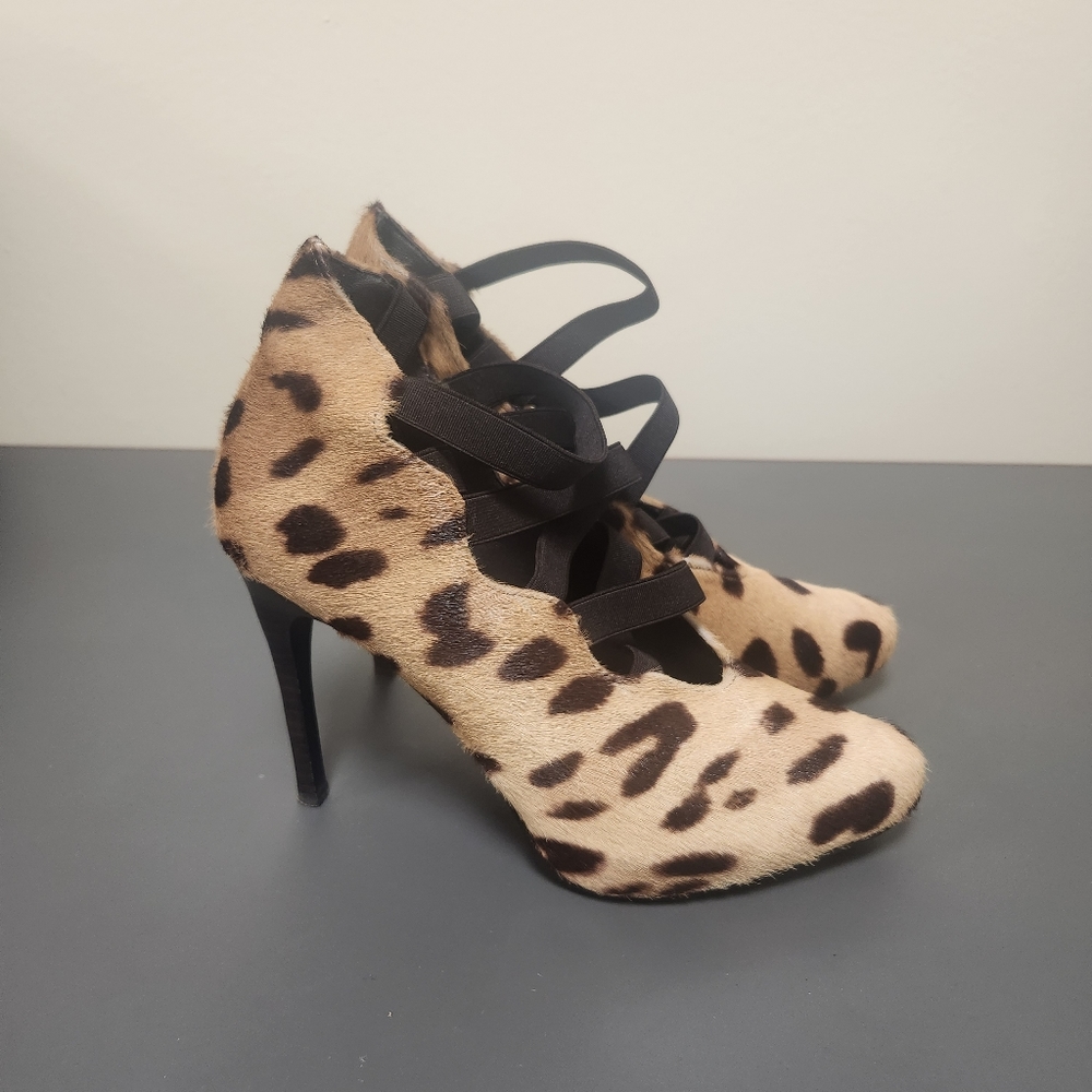 Donald Pliner Micki calf hair Animal Print Pumps with crossover elastic …